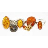 Five items of white and yellow metal amber set jewellery, four pieces marked '925', gross wt. 23.1g.