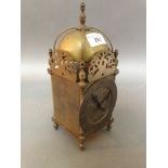 A brass lantern clock, by Laing Glasgow, of typical form, 25cm height.