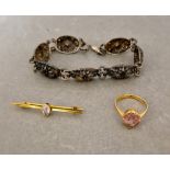 Assorted jewellery comprising a hallmarked 9ct gold ring set with paste and a bar brooch marked '