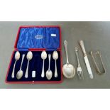 Assorted hallmarked silver including a cased set of six spoons, a large spoon, sugar tongs, fork and