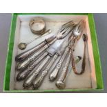 Assorted hallmarked silver comprising silver bladed knives and forks, two mustard spoons, a pair