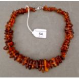 A vintage raw amber bead necklace with silver clasp, marked 925, length 51cm.