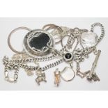 A mixed lot of silver and white metal jewellery.