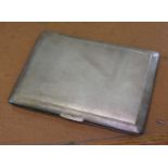 A hallmarked silver cigarette case, 11.5cm x 8.5cm, wt. 5 1/4ozt.