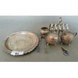 Four Anglo-Indian white metal objects, Kutch, comprising a salver with pierced raised rim, a globe