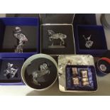 A collection of mainly Swarovski crystal ornaments including a flamingo, two horses, a cat etc.