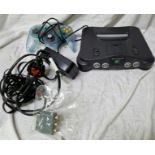 A Nintendo 64 console, controller and cables.