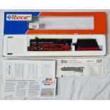 A Roco locomotive HO 43260 OB BR 44 1085, mint in box. (Vendors father brought back 2 items each