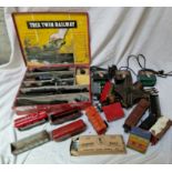 A box of vintage railway items to include a 00 gauge Trix twin railway set and 0 gauge tin plate