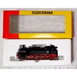 A Fleischmann locomotive 4090 DB 94713, mint in box. (Vendors father brought back 2 items each