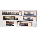 Six Marklin HO rolling stock items to include 48450,4473,4867,4867,4771,4618, mint in boxes. (