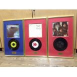 Three Pink Floyd framed vinyl singles comprising See Emily Play, One of These Days and French