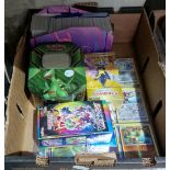 A box of approx. 1100 Pokemon cards to include 90 holograms. sold as seen, no returns.