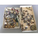Two trays of various militaria and collectables including buttons, lead soldiers, bullet casings, an