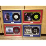 Four Pink Floyd framed vinyl singles comprising On The Turning Away, Not Now John, When The Tigers