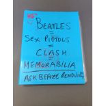 A binder of Beatles and Sex Pistols memorabilia including singles etc.