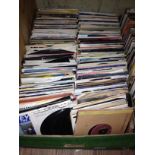 A box of approx. 200 45s, various dates and genres.