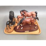A group of three Beswick horses comprising Black Beauty And Foal, Spirit of Nature and Spirit of