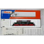 A Roco locomotive HO 43713 DR BR 254, 020-1, mint in box. (Vendors father brought back 2 items