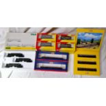 A box of rolling stock items to include 12 x Hornby 00 gauge shell perol tankers R6371, 2 x Bachmann