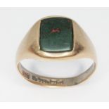 An antique bloodstone signet ring, hallmarked 15ct gold, sponsor's mark 'E.V', Birmingham 1912,