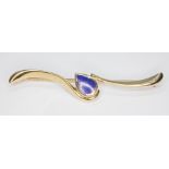 A hallmarked 9ct gold brooch set with a blue tear drop panel, length 55mm, gross wt. 5.3g.