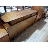 A vintage G Plan 'Librenza' tola teak and ebonised sideboard, length 149cm.