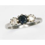 A diamond and sapphire ring, platinum hallmarks, gross wt. 3.2g, size L.