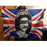 An original Sex Pistols God Save The Queen flag, circa 1980, 105cm x 74cm, after the iconic