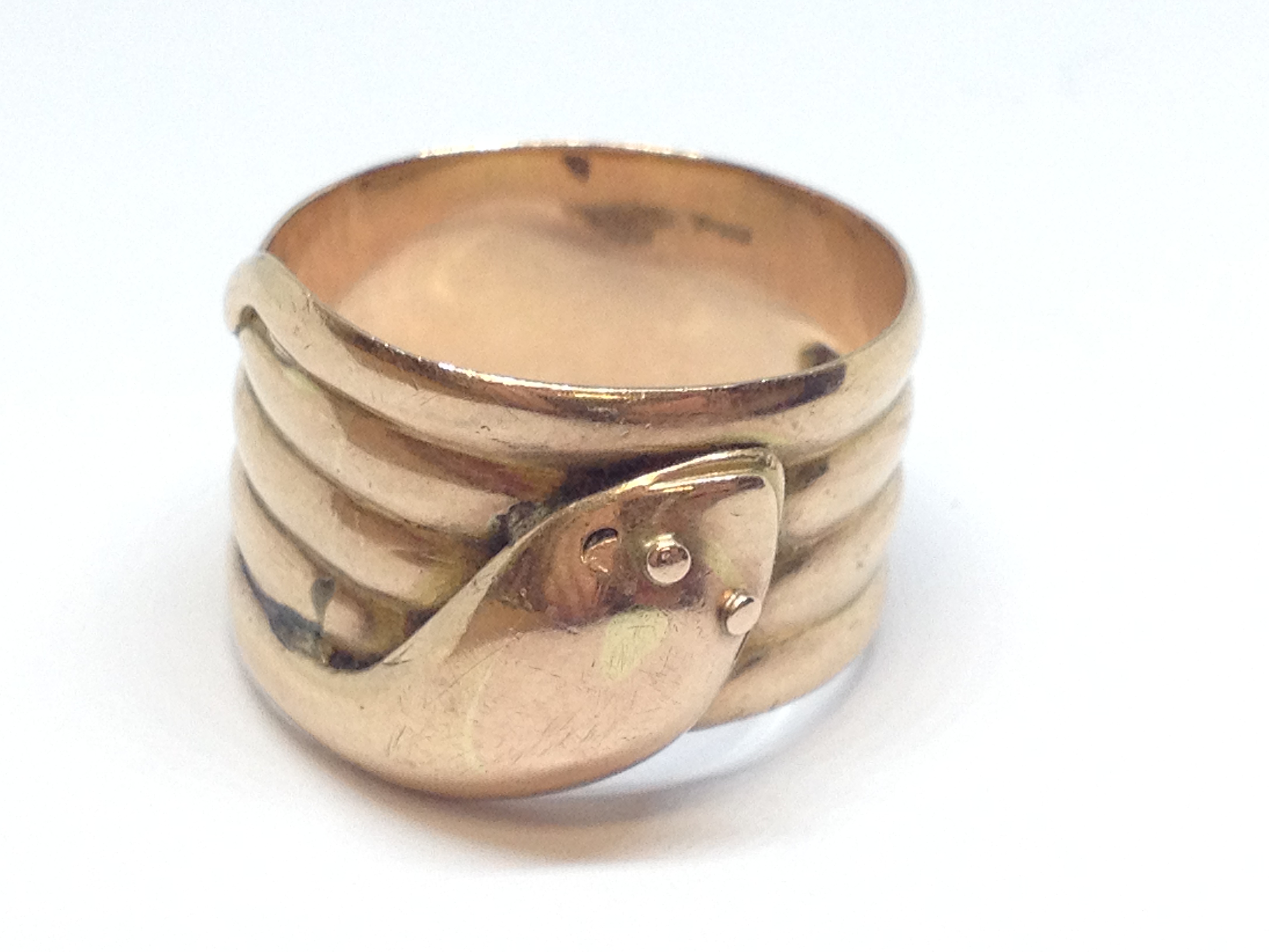 A 9ct gold ring formed as a coiled snake, hallmarked 9ct gold, sponsor mark indistinct, Birmingham - Image 3 of 4