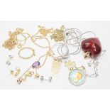 A mixed lot of assorted gold jewellery, comprising chains, pendants, odd earrings, a ring etc.
