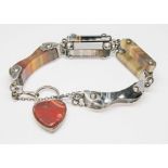 A Victorian white metal sardonyx and agate bracelet with heart shaped padlock clasp, length 14cm,