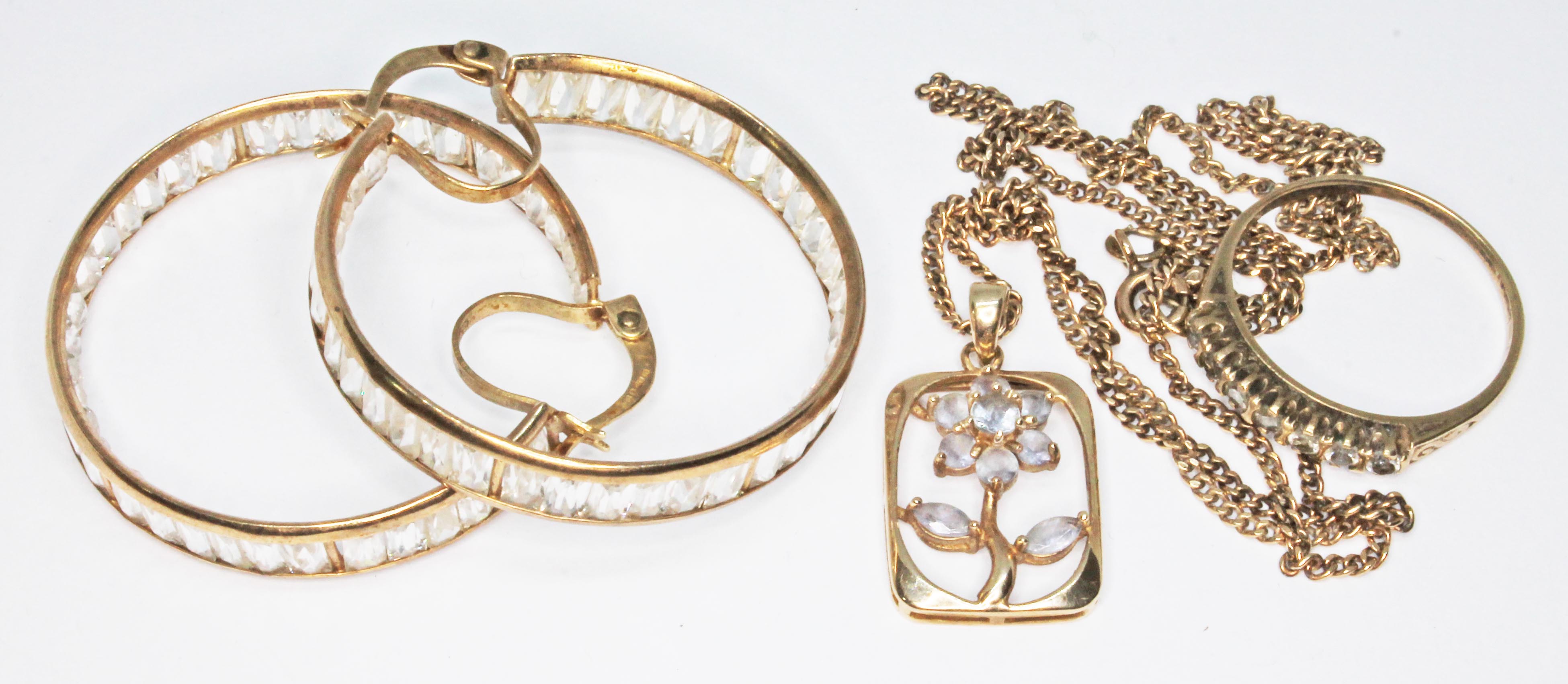 A mixed lot of 9ct gold comprising a pair of earrings, a ring and a pendant on chain, various marks,