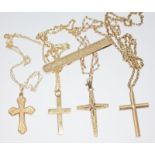 Four cross pendants on chains and a tie clip, various 9ct marks, wt. 14.8g.