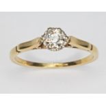 A diamond solitaire ring, the round cut diamond weighing approx. 0.33cts, hallmarked 18ct gold band,