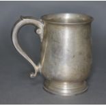 A George V silver tankard with scroll handle, Adie Brothers, Birmingham 1928, height 12.5cm, wt.