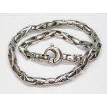 A modern white metal bracelet with lobster claw clasp, marked '18Kt', length 22.5cm, wt. 17.6g.