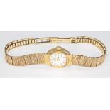 A ladies hallmarked 9ct gold Rotary wristwatch with 9ct gold strap, gross wt. 15.7g.