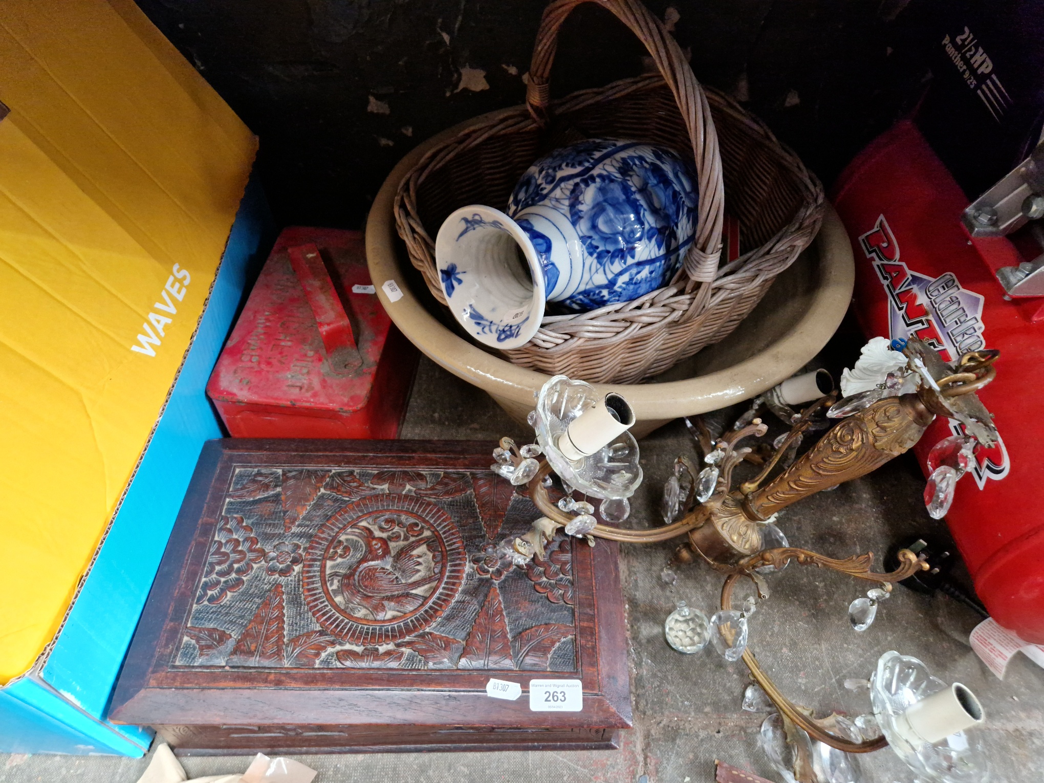 A mixed lot including a carved wooden box, a Japanese arita vase, a ceiling light fitting, metal