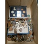 A box of UK and world coins including a cased UK coin set.