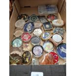 A box containing various glass paperweights etc.