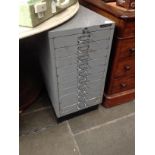 A Matthews ten drawer metal filing cabinet.