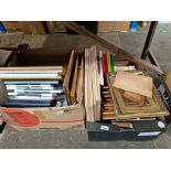 Two boxes of used and unused picture/photo frames