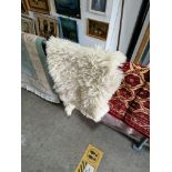 A double pelt sheepskin rug, length 190cm.