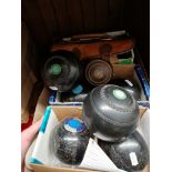 3 sets of crown green bowls, including one in a case, and three jacks.