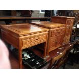 Three pieces of Chinese carved hardwood furniture; a coffee table, side cabinet and HiFi cabinet.