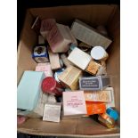 A box of perfumes and cosmetics