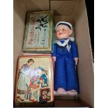 A vintage stuffed doll in sailor outfit, a vintage tin money box, and a Peddo-Ball Junior table