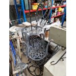 A metal garden table and 4 chairs