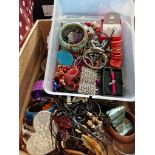 A box and a tray of costume jewellery.